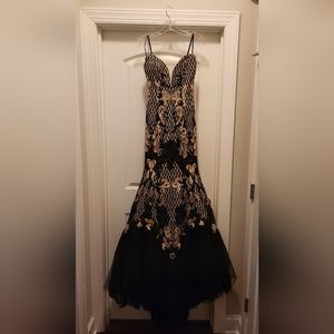 Black and gold Johnathan Kayne prom dress